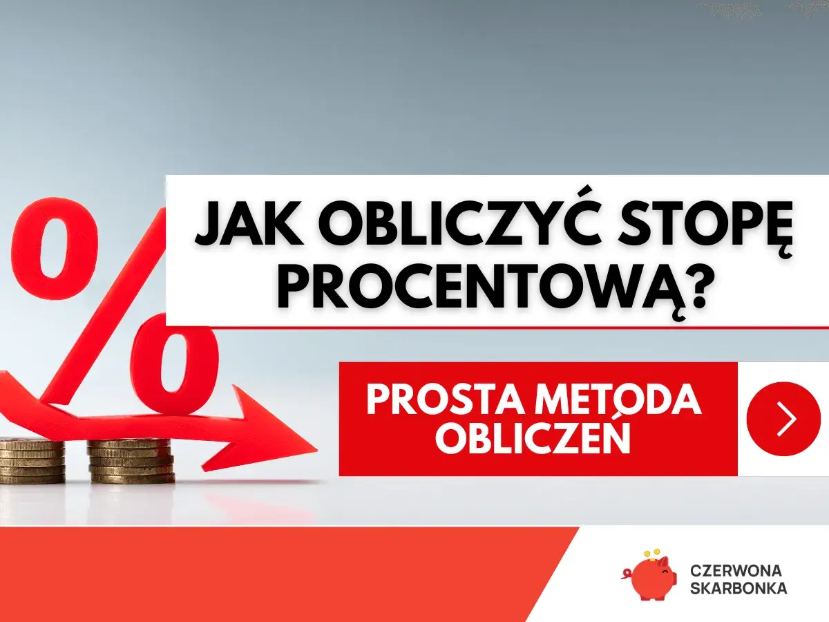 Czerwony symbol procentu i strzałka wskazująca w dół nad monetami.